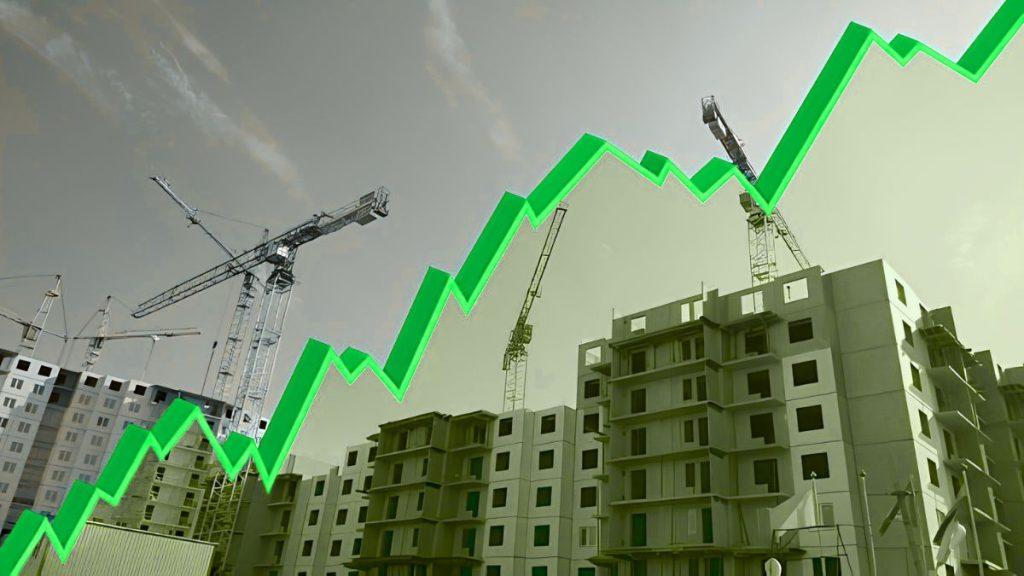 Green upward-trending chart superimposed over a construction site with cranes and buildings, indicating growth in construction